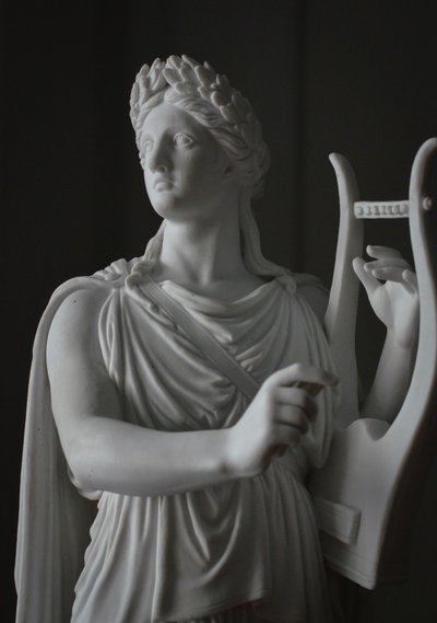 Pair of neoclassical biscuit statuettes