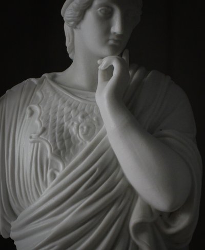 Pair of neoclassical biscuit statuettes
