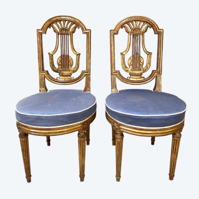 Pair of Louis XVI style chairs in gilded wood