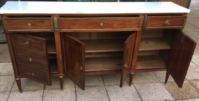 A Louis XVI-style enfilade sideboard in varnished mahogany