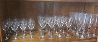 Set of crystal glasses, blue drop at the top of the leg.