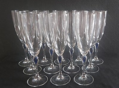 Set of crystal glasses, blue drop at the top of the leg.