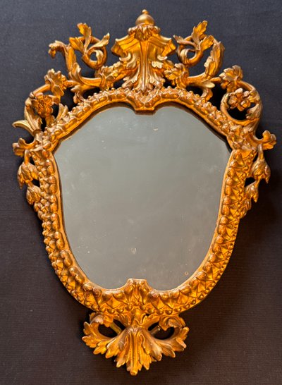 Mirror with gilded wood escutcheon 18th century Italy H 44