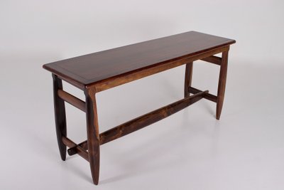 Sergio Rodriguez-style console table in exotic wood.