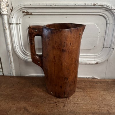 Brutalist pitcher in monoxide wood enhanced with nails, 20th century folk art