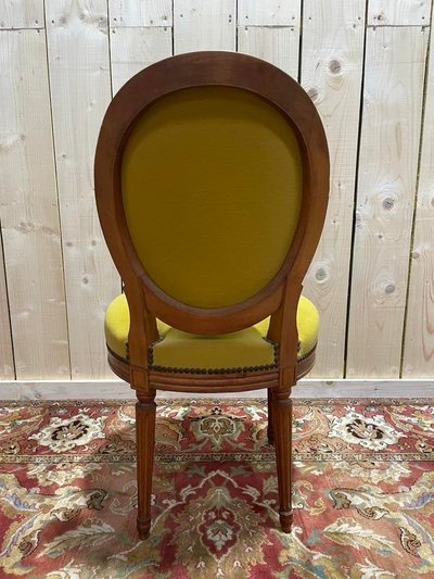 Suite di 4 sedie in stile giallo Louis XVI giallo