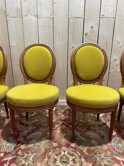 Suite di 4 sedie in stile giallo Louis XVI giallo
