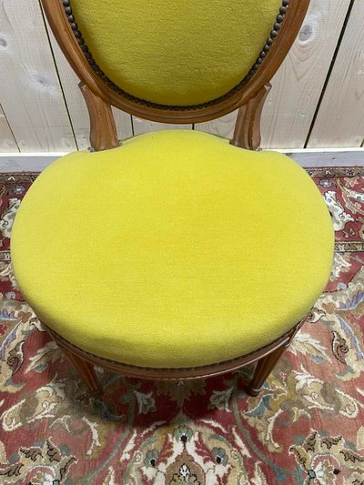 Suite di 4 sedie in stile giallo Louis XVI giallo