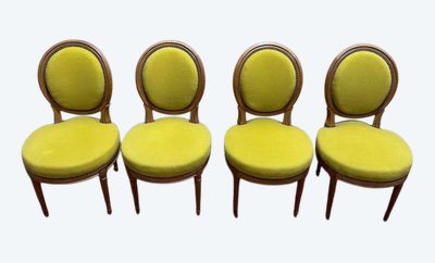 Suite di 4 sedie in stile giallo Louis XVI giallo