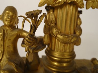 Small ormolu gardener clock with watering can Berthoud Paris 19th century