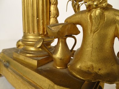 Small ormolu gardener clock with watering can Berthoud Paris 19th century