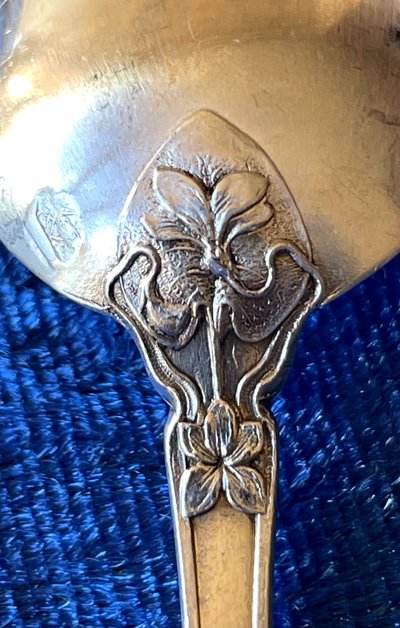 12 art nouveau teaspoons.