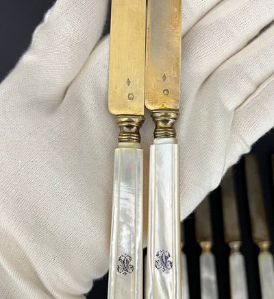 Set of 12 Minerve silver knives B.Lorillon (Paris,1854-1857), monogrammed mother-of-pearl handles