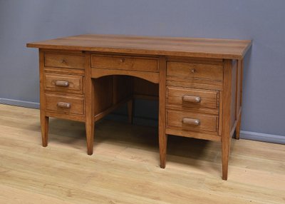 Solid oak pedestal desk, Régy - 1940