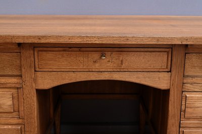 Solid oak pedestal desk, Régy - 1940