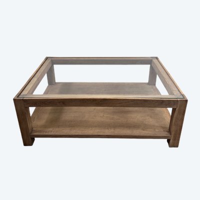 Table basse brutaliste en chêne avec un plateau verre