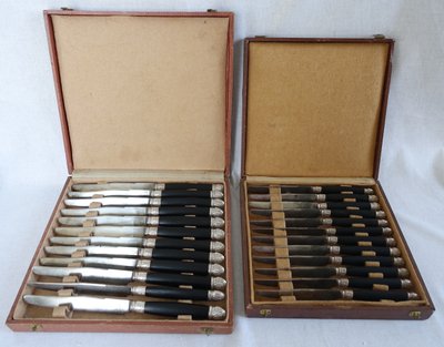 Empire style cabinet of ebony knives, solid silver ferrules and bases - 24 pieces