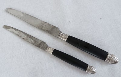 Empire style cabinet of ebony knives, solid silver ferrules and bases - 24 pieces