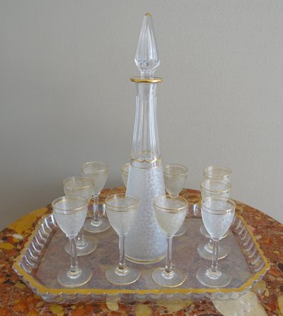 Saint Louis crystal liqueur service with frosted and gilded effect: decanters, glasses and tray