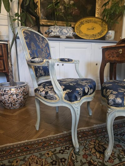 Pair of Louis XV period cabriolet armchairs in lacquered beech.