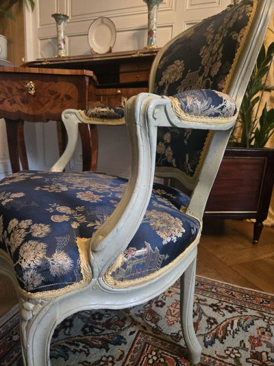 Pair of Louis XV period cabriolet armchairs in lacquered beech.