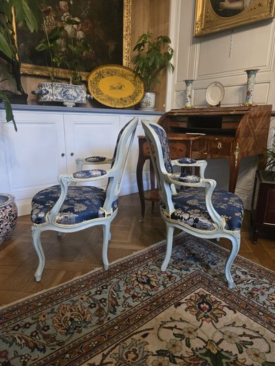 Pair of Louis XV period cabriolet armchairs in lacquered beech.