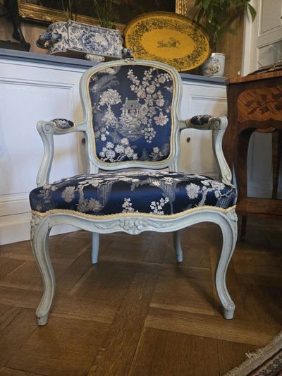 Pair of Louis XV period cabriolet armchairs in lacquered beech.