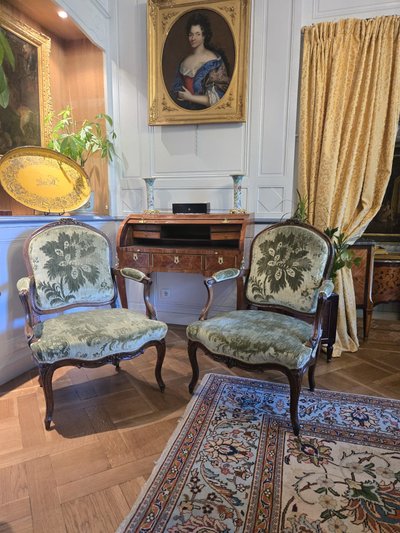 Pair of walnut "à la reine" armchairs, Louis XV period