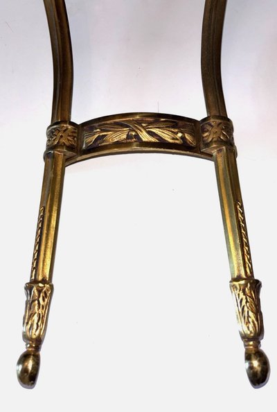 Louis XVI style floating half-moon console with marble top and chased brass structure