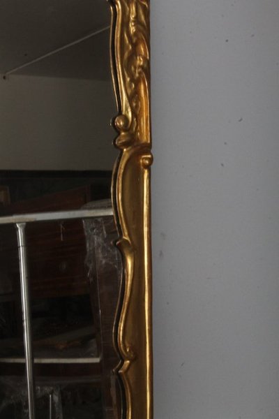 Paire de miroirs anciens Louis XVI 1750 en or pur. Dimensions 124 x 70 cm