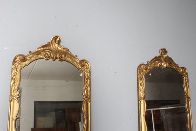 Paire de miroirs anciens Louis XVI 1750 en or pur. Dimensions 124 x 70 cm