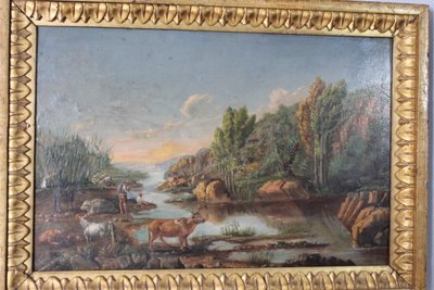 Peinture à l'huile sur panneau de la fin du XVIIIe siècle dans un cadre ancien. Paysage avec vaches au pâturage. 50 x