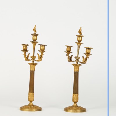 Pair of Empire style candlesticks, 19th century