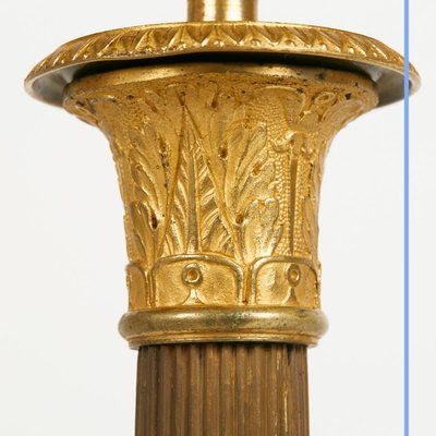 Pair of Empire style candlesticks, 19th century