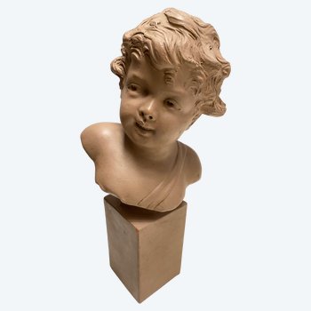 Busto di bambino in terracotta patinata