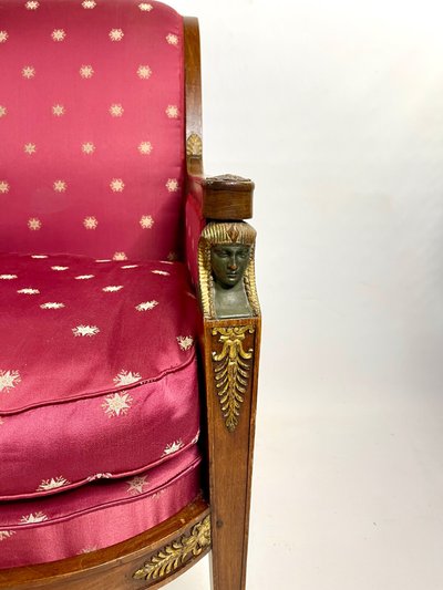 Empire-style square armchair with carved Egyptian figures, attributable to a Paris workshop