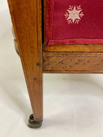 Empire-style square armchair with carved Egyptian figures, attributable to a Paris workshop