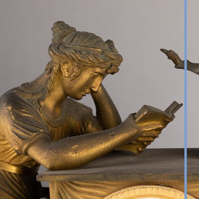 "La liseuse" clock in gilded bronze and green marble, 19th century