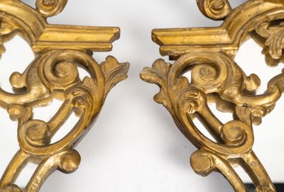 A pair of carved and gilded wood mirrors, 18th century