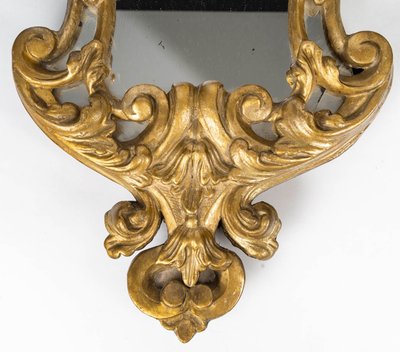 A pair of carved and gilded wood mirrors, 18th century