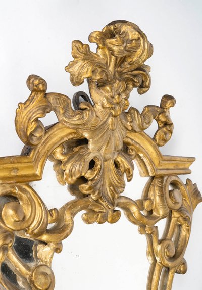 A pair of carved and gilded wood mirrors, 18th century