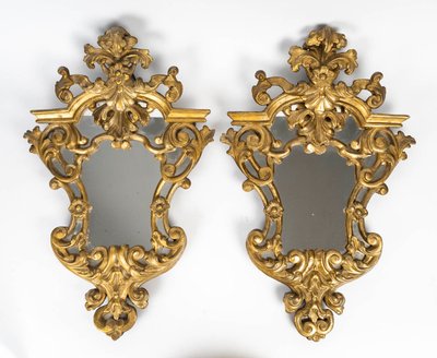 A pair of carved and gilded wood mirrors, 18th century