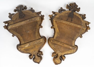 A pair of carved and gilded wood mirrors, 18th century
