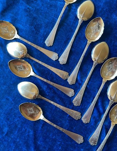 12 Puiforcat ice cream scoops.
