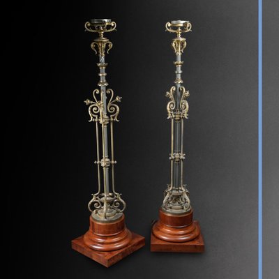 Pair of torchères, in mahogany and brass, 19th century