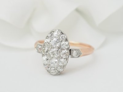Bague ancienne pavée de diamants en or rose et platine