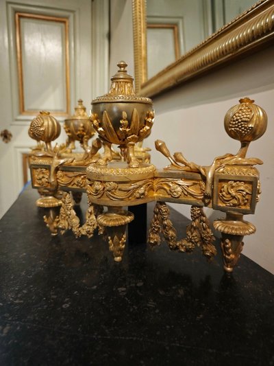 Pair of gilt bronze Chenets with Antique style Pots in the Louis XVI style 19th century