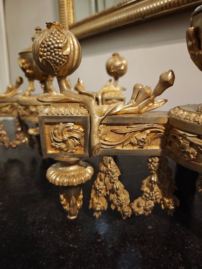 Pair of gilt bronze Chenets with Antique style Pots in the Louis XVI style 19th century