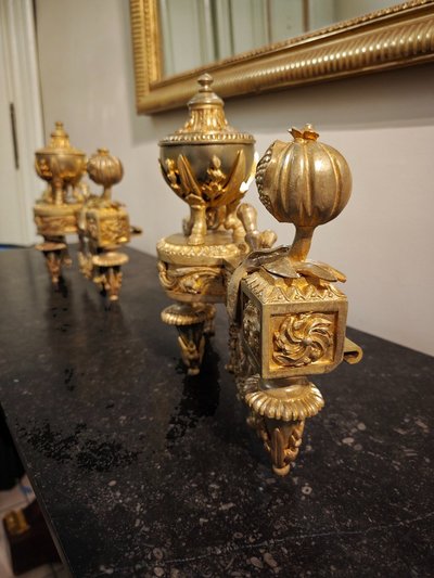 Pair of gilt bronze Chenets with Antique style Pots in the Louis XVI style 19th century