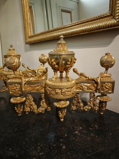 Pair of gilt bronze Chenets with Antique style Pots in the Louis XVI style 19th century